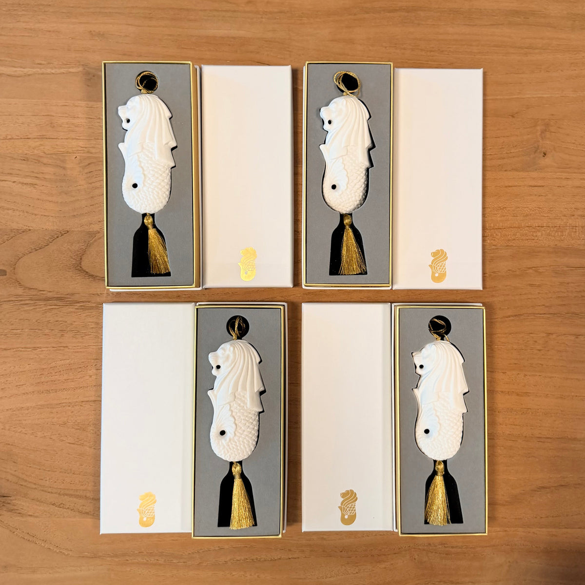 Bundle of 4 gold and ceramic white merlion decorations with gold tassels and gift boxes
